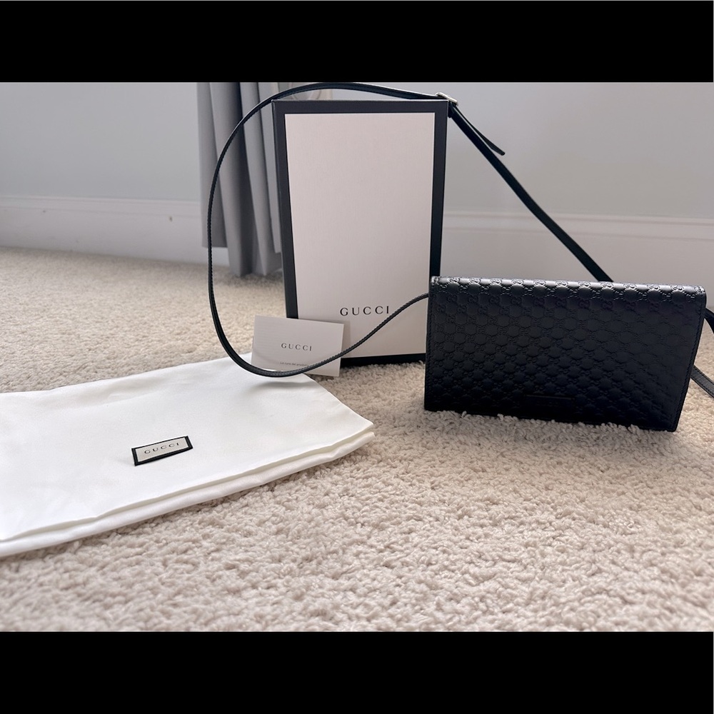 Black Gucci crossbody/clutch